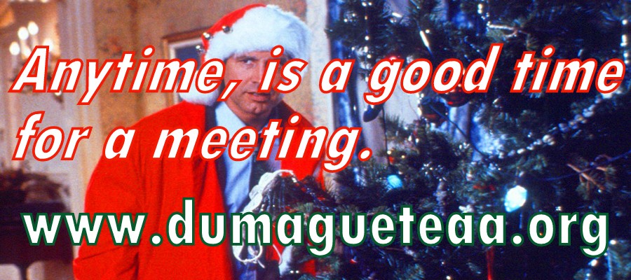 Humorous Christmas-themed recovery graphic from the original DumagueteAA.org website encouraging AA meeting attendance during the holiday season.